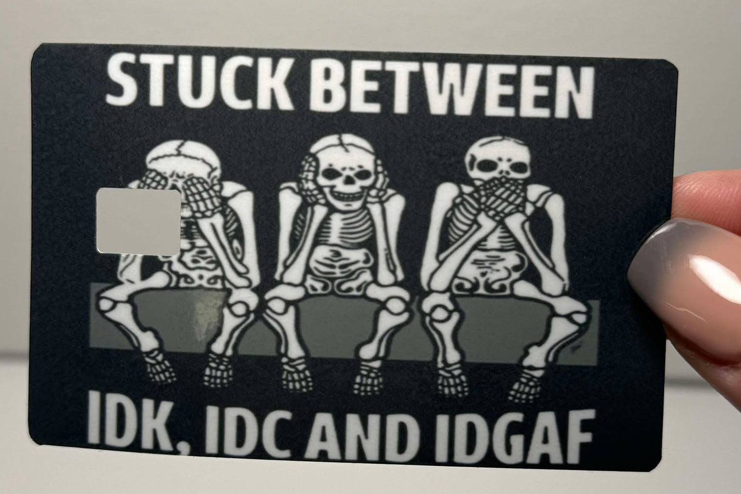 Skeleton Stuck Between IDK, IDC, & IDGAF  Credit / Debit Card Skin