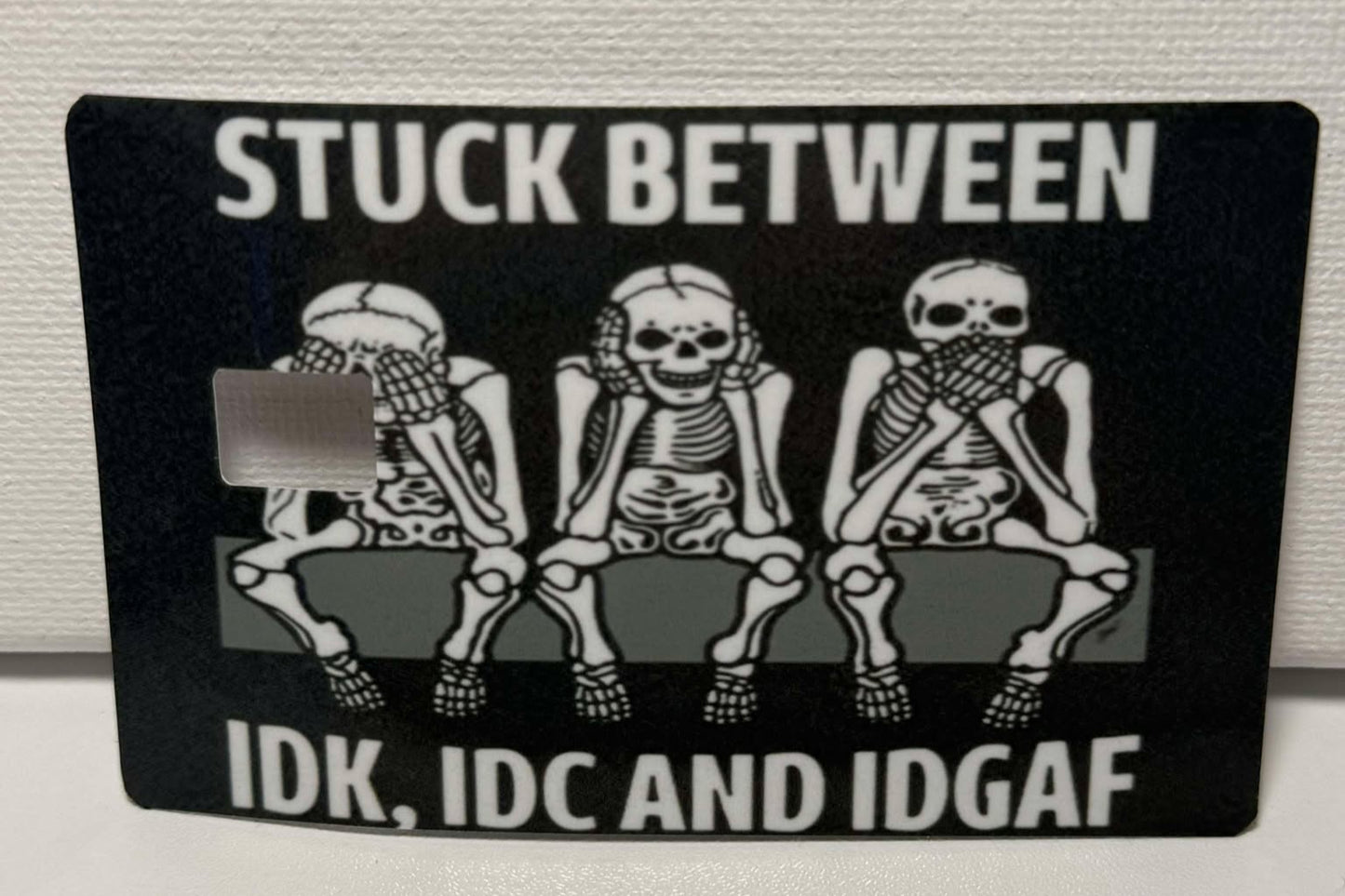 Skeleton Stuck Between IDK, IDC, & IDGAF  Credit / Debit Card Skin