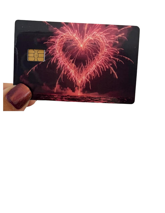 Heartburst Fireworks Card Skin – Pink Heart-Shaped Skyburst Over Water