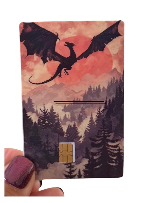 Crimson Sky Dragon Credit Card Skin – Sunset Flight Fantasy with Mountain Forest Background